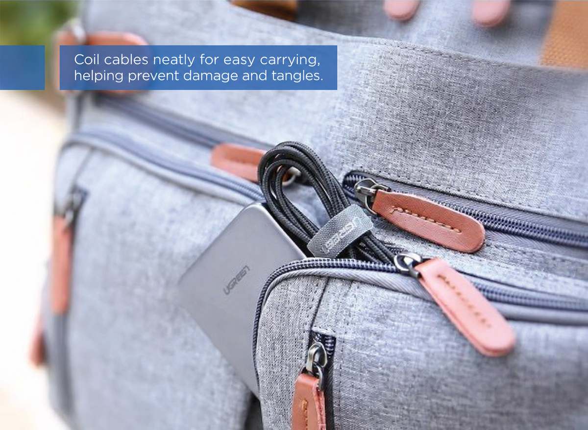 UGREEN 50370 reusable cable tie securing a cable for travel storage
