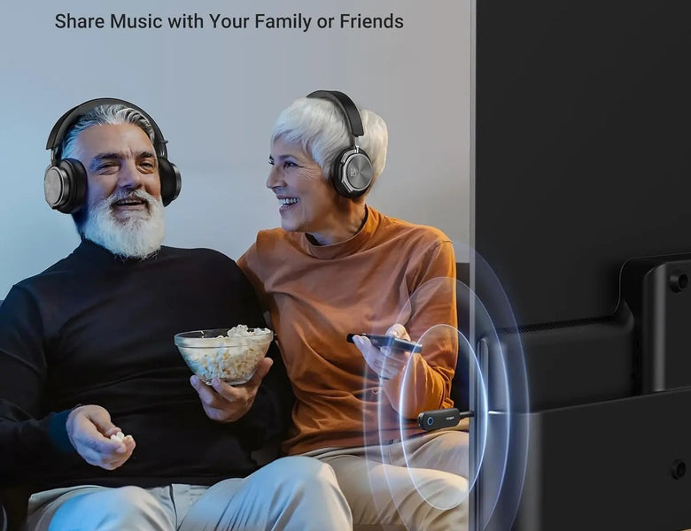 Wireless headphones used with a UGREEN Bluetooth transmitter for TV listening