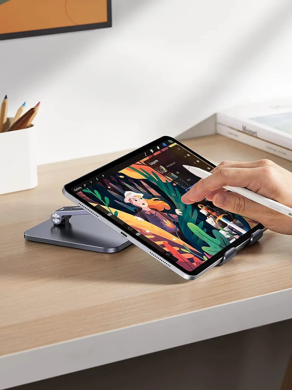 UGREEN LP134 tablet stand positioned at a low angle for drawing with a stylus