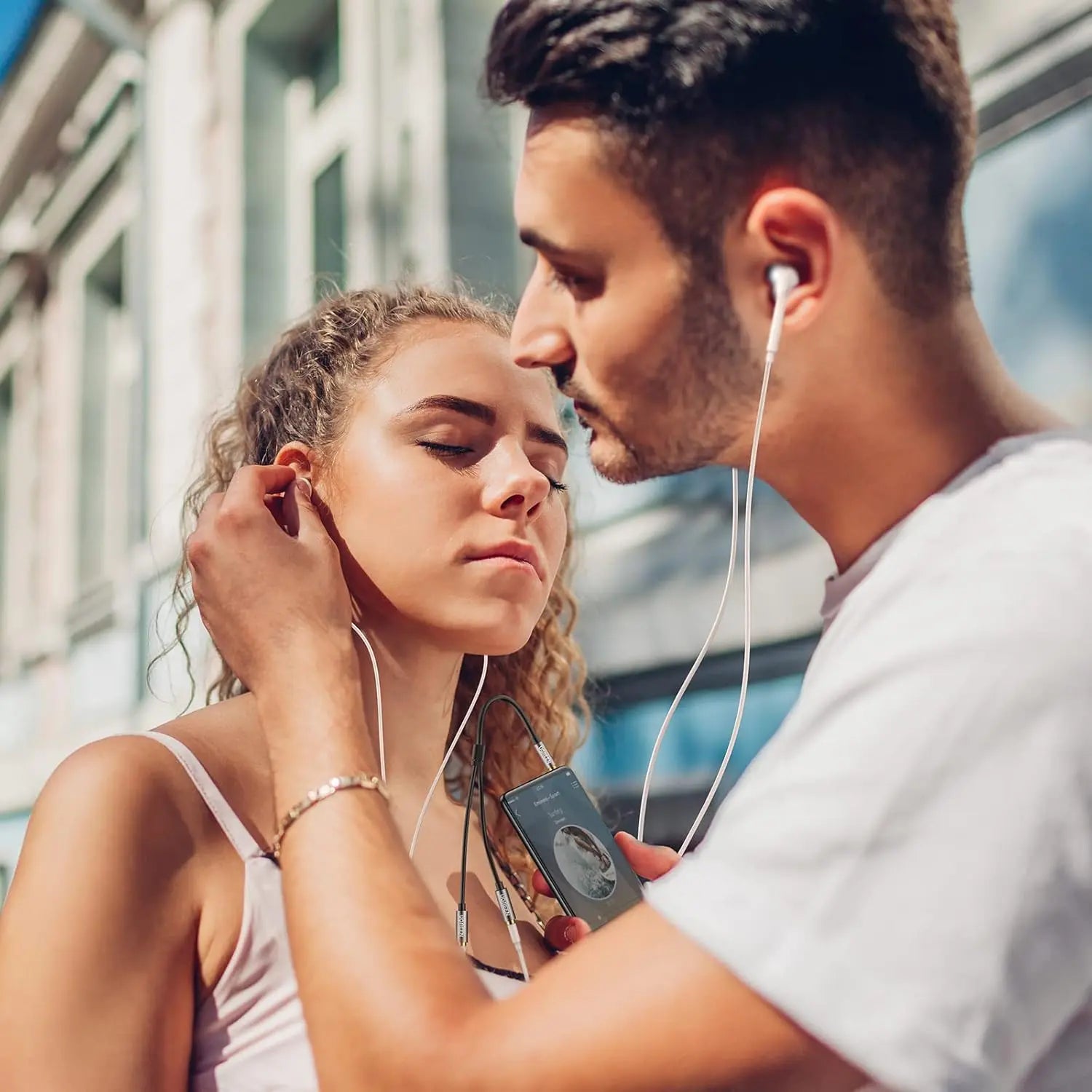 UGREEN headphone splitter for two people sharing music with earphones