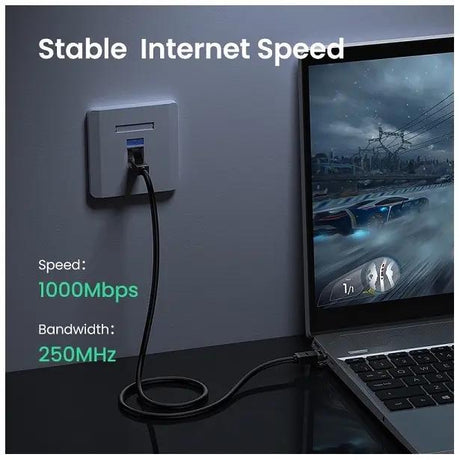 UGREEN Cat6 cable connecting a laptop to an Ethernet wall port with 1000Mbps and 250MHz specifications