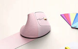 UGREEN 55917 pink vertical mouse beside a laptop