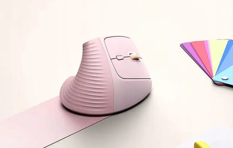 UGREEN 55917 pink vertical mouse beside a laptop